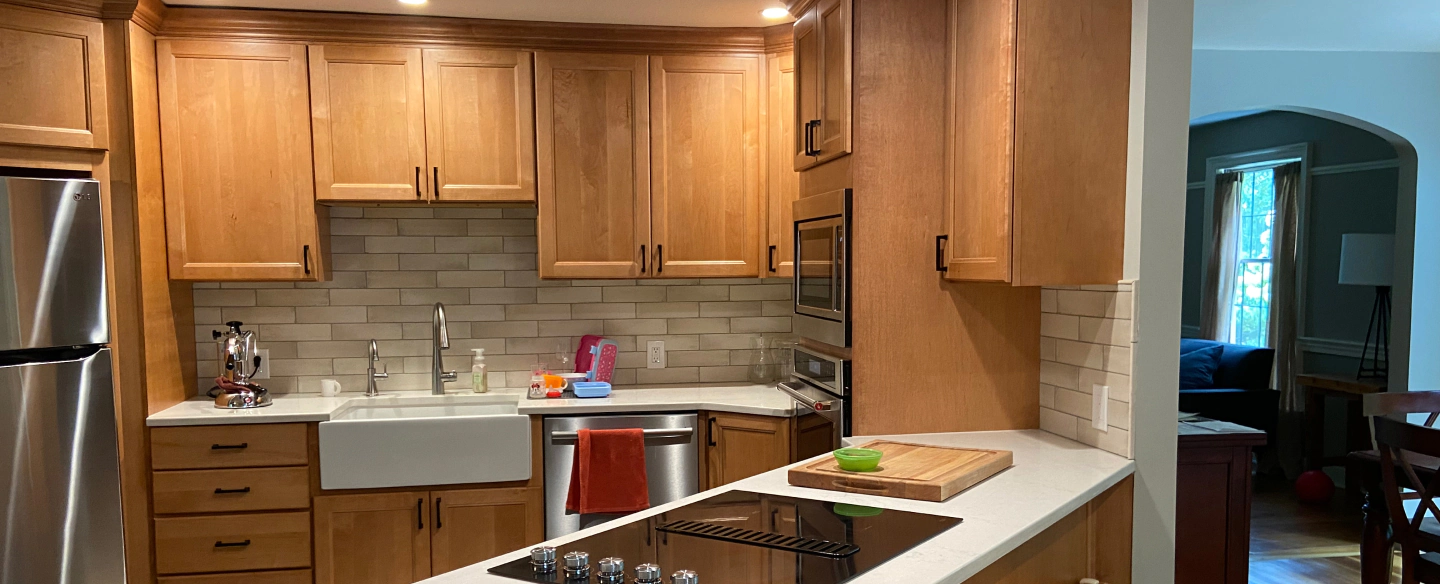 newly installed wooden cabinets in a remodeled kitchen