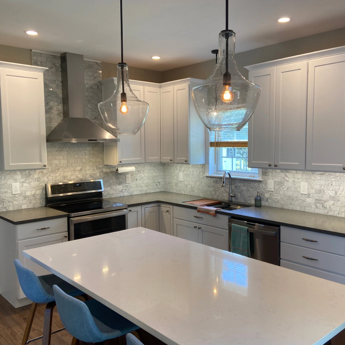 remodeled kitchen with white cabinets