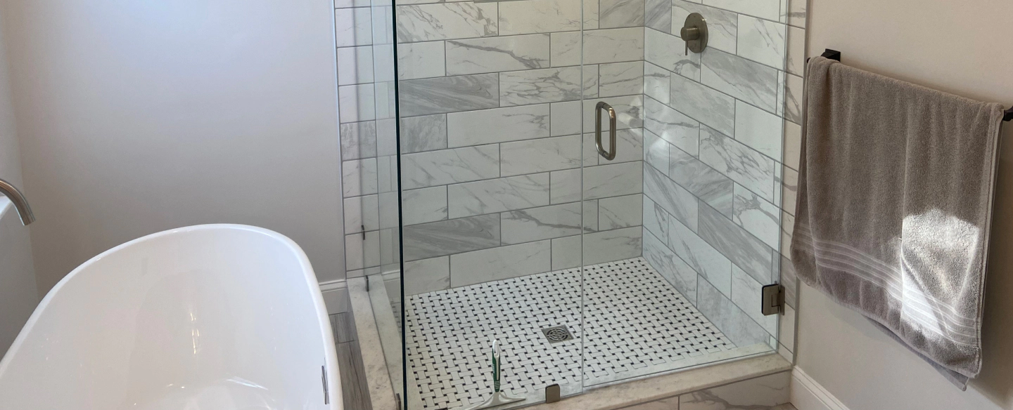 shower and bathtub installed in a bathroom